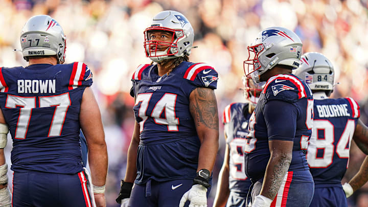 Oct 27, 2024; Foxborough, Massachusetts, USA; New England Patriots guard Michael Jordan (74) watches the replay on the big screen after a touchdown against the New York Jets in the second half at Gillette Stadium.
