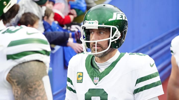 Dec 29, 2024; Orchard Park, New York, USA; New York Jets quarterback Aaron Rodgers (8) walks out onto the field prior to the game against the Buffalo Bills at Highmark Stadium. Mandatory Credit: Gregory Fisher-Imagn Images