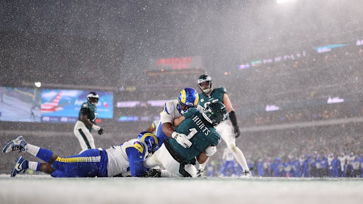 Jalen Hurts is sacked during the second half in the snowstorm at Philadelphia.