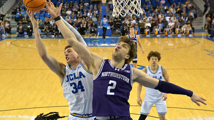 Jan 24, 2026; Los Angeles, California, USA;  UCLA Bruins forward Tyler Bilodeau (34) and Northwestern Wildcats forward Nick Martinelli (2) go for a rebound in the first half at Pauley Pavilion presented by Wescom Financial. Mandatory Credit: Jayne Kamin-Oncea-Imagn Images