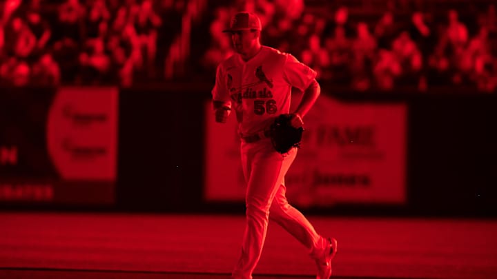 May 17, 2023; St. Louis, Missouri, USA; St. Louis Cardinals relief pitcher Ryan Helsley (56) runs onto the field in the eighth inning at Busch Stadium. Mandatory Credit: Paul Halfacre-Imagn Images