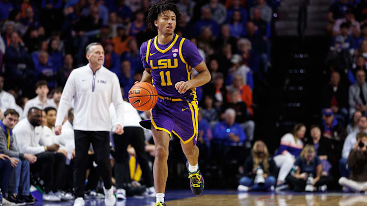 Jan 20, 2026; Gainesville, Florida, USA; Louisiana State Tigers guard Dedan Thomas Jr. (11) dribbles the ball against the Florida Gators during the first half at Exactech Arena at the Stephen C. O'Connell Center. Mandatory Credit: Matt Pendleton-Imagn Images Jan 20, 2026; Gainesville, Florida, USA; Louisiana State Tigers guard Dedan Thomas Jr. (11) dribbles the ball against the Florida Gators during the first half at Exactech Arena at the Stephen C. O'Connell Center. Mandatory Credit: Matt Pendleton-Imagn Images