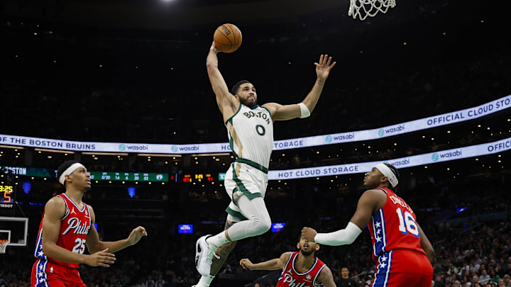 Feb 27, 2024; Boston, Massachusetts, USA; Boston Celtics forward Jayson Tatum (0) goes in for a dunk as Philadelphia 76ers forward Darius Bazley (25) and guard Ricky Council IV (16) look on during the second half at TD Garden. Mandatory Credit: Winslow Townson-Imagn Images Feb 27, 2024; Boston, Massachusetts, USA; Boston Celtics forward Jayson Tatum (0) goes in for a dunk as Philadelphia 76ers forward Darius Bazley (25) and guard Ricky Council IV (16) look on during the second half at TD Garden. Mandatory Credit: Winslow Townson-Imagn Images