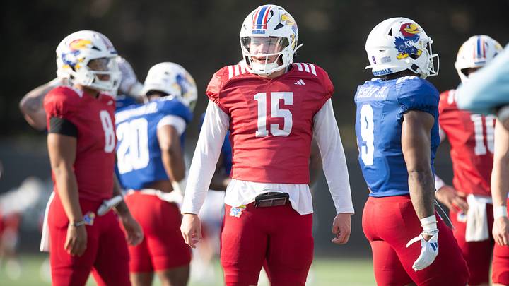 Kansas redshirt sophomore quarterback Cole Ballard (15) works through drills during an outdoor practice on Thursday, March 27, 2025. Kansas redshirt sophomore quarterback Cole Ballard (15) works through drills during an outdoor practice on Thursday, March 27, 2025.