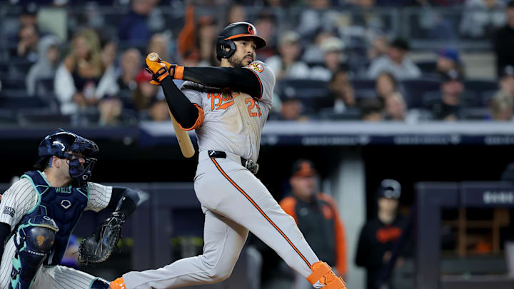 Sep 25, 2024; Bronx, New York, USA; Baltimore Orioles right fielder Anthony Santander (25) follows through on an RBI double against the New York Yankees during the fourth inning at Yankee Stadium.