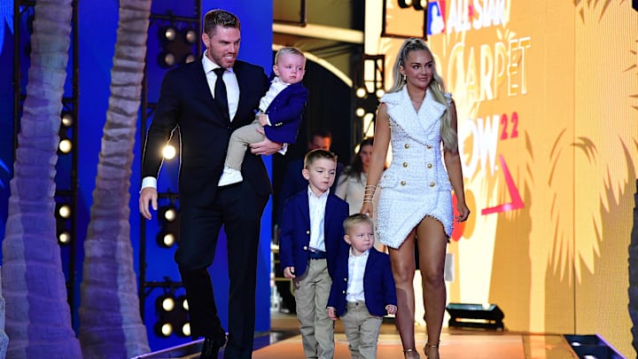 Jul 19, 2022; Los Angeles, CA, USA; National League first baseman Freddie Freeman (5) of the Los Angeles Dodgers with wife Chelsea during the Red Carpet Show at L.A. Live. Mandatory Credit: Gary A. Vasquez-USA TODAY Sports