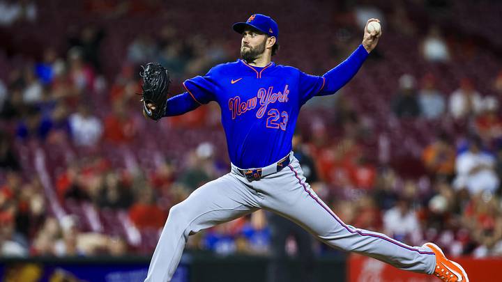 Jun 15, 2026; Cincinnati, Ohio, USA; New York Mets relief pitcher David Peterson (23) pitches against the Cincinnati Reds in the seventh inning at Great American Ball Park. 