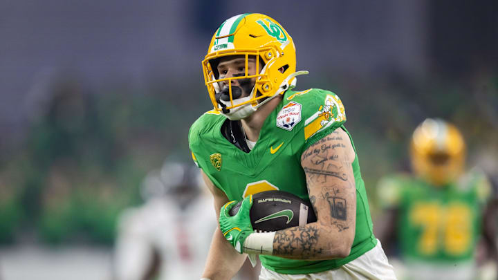 Jan 1, 2024; Glendale, AZ, USA; Oregon Ducks tight end Terrance Ferguson (3) against the Liberty Flames during the 2024 Fiesta Bowl at State Farm Stadium. Mandatory Credit: Mark J. Rebilas-Imagn Images