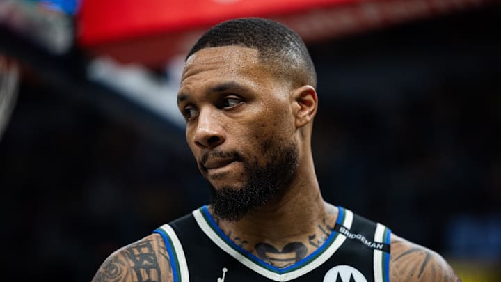 Milwaukee Bucks guard Damian Lillard looks on during a playoff game.