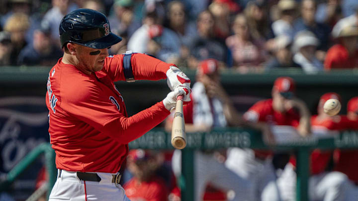 Feb 23, 2025; Fort Myers, Florida, USA; Boston Red Sox infielder Alex Bregman (2) connects with the ball for a double in the fourth inning of their game against the Toronto Blue Jays at JetBlue Park at Fenway South. Mandatory Credit: Chris Tilley-Imagn Images