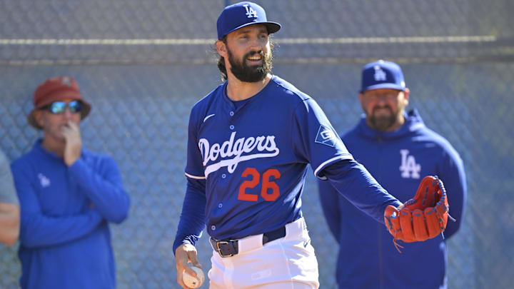 Feb 18, 2025; Glendale, AZ, USA;  Los Angeles Dodgers starting pitcher Tony Gonsolin (26) throws a bullpen session during spring training workouts at Camelback Ranch. 
