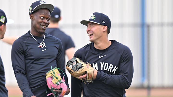 Feb 16, 2026; Tampa, FL, USA; New York Yankees infielder Anthony Volpe (11) and infielder Jazz Chisholm Jr. (13) take a break during spring training at George M. Steinbrenner Field. Mandatory Credit: Jonathan Dyer-Imagn Images