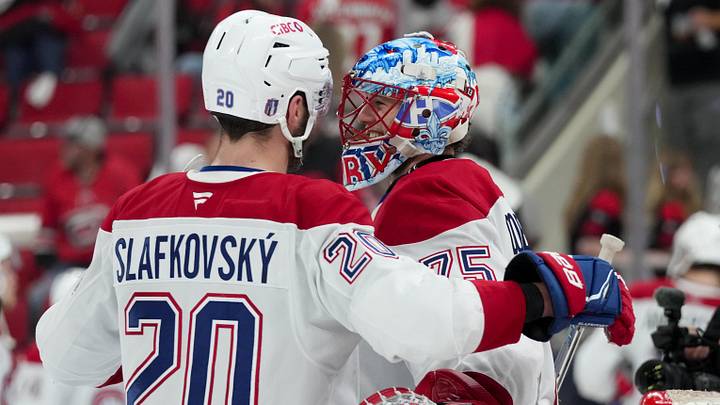 May 21, 2026; Raleigh, North Carolina, USA; Montreal Canadiens left wing Juraj Slafkovsky (20) congratulates goaltender Jakub Dobes (75) after a win against the Carolina Hurricanes of game one of the Eastern Conferene Final of the 2026 Stanley Cup Playoffs at Lenovo Center. Mandatory Credit: James Guillory-Imagn Images May 21, 2026; Raleigh, North Carolina, USA; Montreal Canadiens left wing Juraj Slafkovsky (20) congratulates goaltender Jakub Dobes (75) after a win against the Carolina Hurricanes of game one of the Eastern Conferene Final of the 2026 Stanley Cup Playoffs at Lenovo Center. Mandatory Credit: James Guillory-Imagn Images