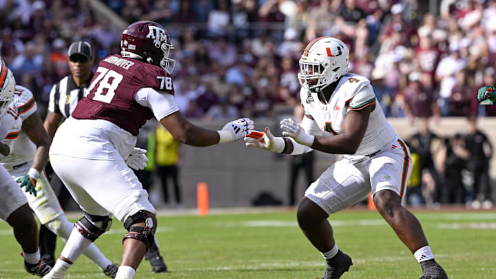 Dec 20, 2025; College Station, TX, USA; Texas A&M Aggies offensive lineman Dametrious Crownover (78) blocks Miami Hurricanes defensive lineman Rueben Bain Jr. (4) during the game between the Aggies and the Hurricanes at Kyle Field. Mandatory Credit: Jerome Miron-Imagn Images