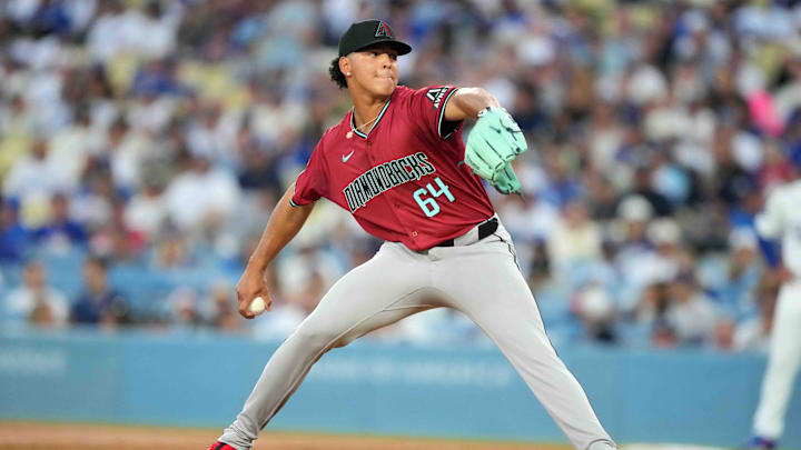 Jul 3, 2024; Los Angeles, California, USA; Arizona Diamondbacks starting pitcher Cristian Mena (64) throws in the second inning against the Los Angeles Dodgers at Dodger Stadium. Mandatory Credit: Kirby Lee-Imagn Images Jul 3, 2024; Los Angeles, California, USA; Arizona Diamondbacks starting pitcher Cristian Mena (64) throws in the second inning against the Los Angeles Dodgers at Dodger Stadium. Mandatory Credit: Kirby Lee-Imagn Images