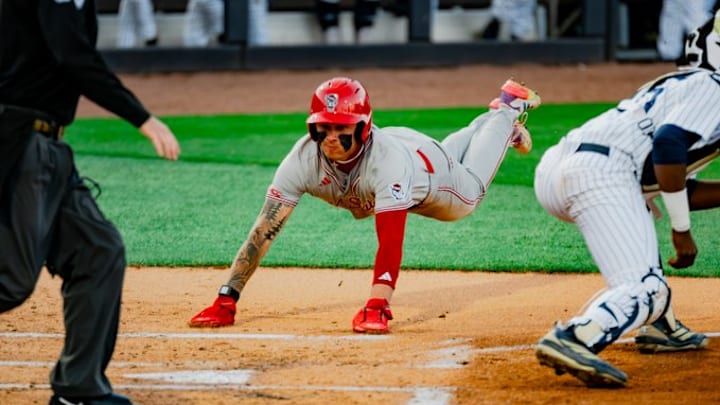 OF Ty Head dives into home plate to score a run during No. 14 NC State's 6-4 loss to No. 3 Georgia Tech in Atlanta, Ga., on March 28, 2026. OF Ty Head dives into home plate to score a run during No. 14 NC State's 6-4 loss to No. 3 Georgia Tech in Atlanta, Ga., on March 28, 2026.