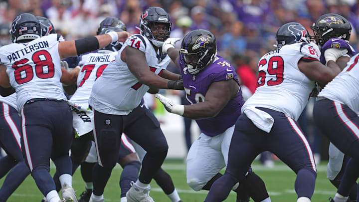 Baltimore Ravens nose tackle Michael Pierce (58) defended by Houston Texans tackle Josh Jones (74) at M&T Bank Stadium. 