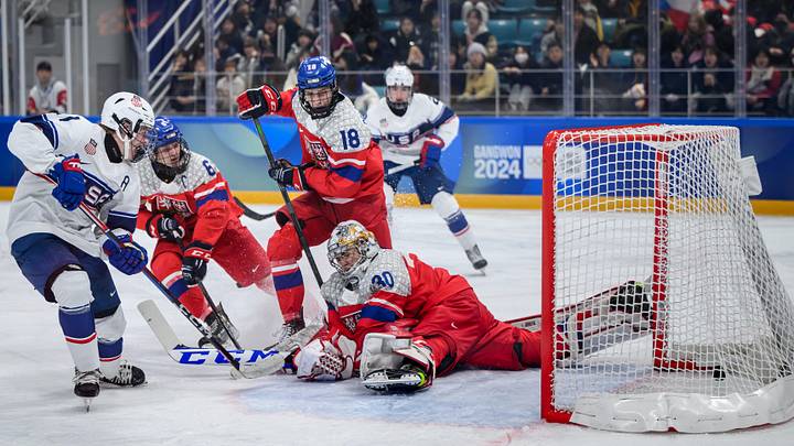 Jan 31, 2024; Gangwon-do, KOR; Mikey Berchild (USA) strikes the puck past goalkeeper Jan Larys (CZE) to score a goal and make it 0-3 in the Ice Hockey Men s 6-on-6 Tournament Gold Medal Game between Czech Republic and (USA) at the Gangneung Hockey Centre. The Winter Youth Olympic Games, Gangwon, South Korea, Wednesday 31 January 2024. Mandatory Credit: OIS/Joe Marklund-Imagn Images