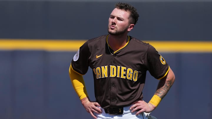 Mar 22, 2025; Peoria, Arizona, USA; San Diego Padres outfielder Jackson Merrill (3) reacts after getting out against the Cincinnati Reds in the first inning at Peoria Sports Complex. Mandatory Credit: Rick Scuteri-Imagn Images