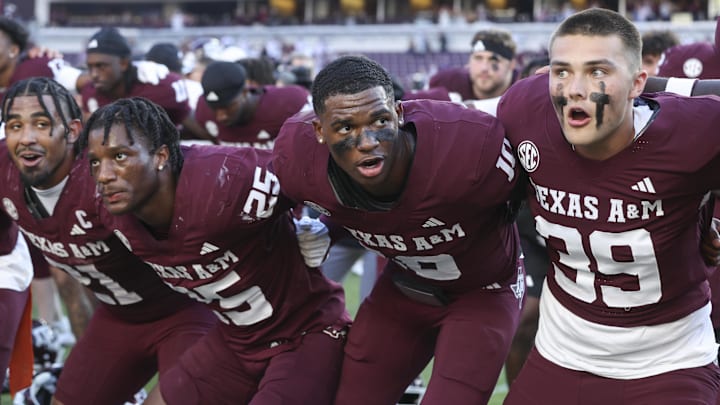 Sep 27, 2025; College Station, Texas, USA; Texas A&M Aggies quarterback Marcel Reed (10) celebrates with teammates after the game against the Auburn Tigers at Kyle Field. Mandatory Credit: Troy Taormina-Imagn Images
