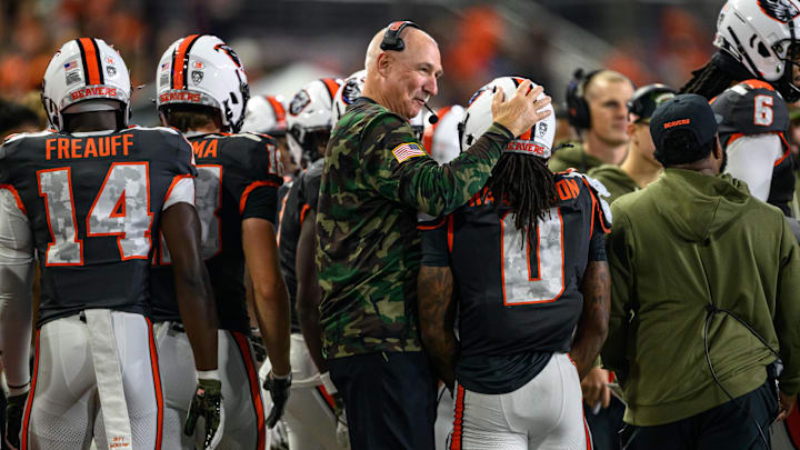 Nov 1, 2025; Corvallis, Oregon, USA; Oregon State Beavers interim head coach Robb Akey congratulates running back Anthony Hankerson (0) for a touchdown run during the fourth quarter against the Washington State Cougars at Reser Stadium. Mandatory Credit: Craig Strobeck-Imagn Images