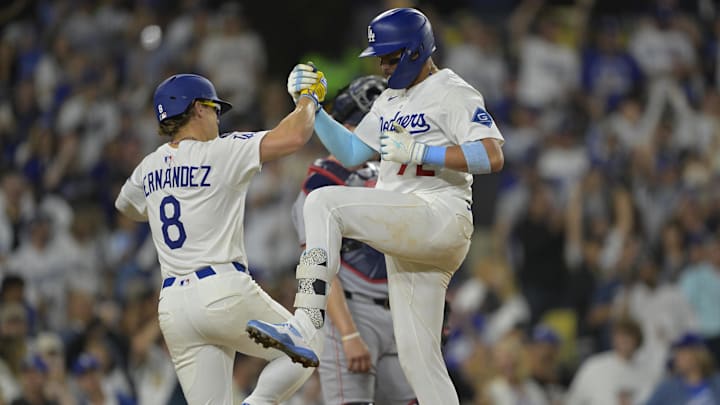 Jun 20, 2025; Los Angeles, California, USA; Los Angeles Dodgers third baseman Miguel Rojas (72) celebrates at the plate with first baseman Enrique Hernandez (8) after hitting a two run home run in the sixth inning against the Washington Nationals at Dodger Stadium. Mandatory Credit: Jayne Kamin-Oncea-Imagn Images Jun 20, 2025; Los Angeles, California, USA; Los Angeles Dodgers third baseman Miguel Rojas (72) celebrates at the plate with first baseman Enrique Hernandez (8) after hitting a two run home run in the sixth inning against the Washington Nationals at Dodger Stadium. Mandatory Credit: Jayne Kamin-Oncea-Imagn Images