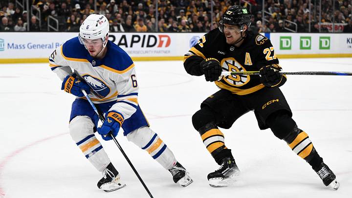 Apr 23, 2026; Boston, Massachusetts, USA; Buffalo Sabres left wing Zach Benson (6) skates against Boston Bruins defenseman Hampus Lindholm (27) during the second period of game three of the first round of the 2026 Stanley Cup Playoffs at the TD Garden. Mandatory Credit: Brian Fluharty-Imagn Images Apr 23, 2026; Boston, Massachusetts, USA; Buffalo Sabres left wing Zach Benson (6) skates against Boston Bruins defenseman Hampus Lindholm (27) during the second period of game three of the first round of the 2026 Stanley Cup Playoffs at the TD Garden. Mandatory Credit: Brian Fluharty-Imagn Images