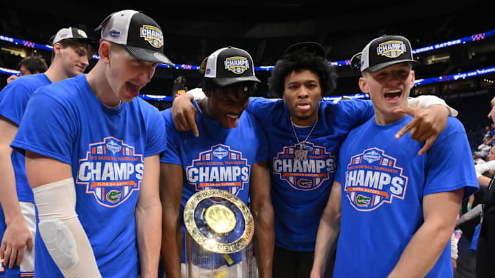 The Florida Gators celebrate after defeating the Tennessee Volunteers in the 2025 SEC Championship Game at Bridgestone Arena. 
