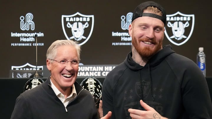 Jan 27, 2025; Las Vegas, NV, USA; Las Vegas Raiders defensive end Maxx Crosby (right) and coach Pete Carroll at press conference at Intermountain Health Performance Center. Mandatory Credit: Kirby Lee-Imagn Images