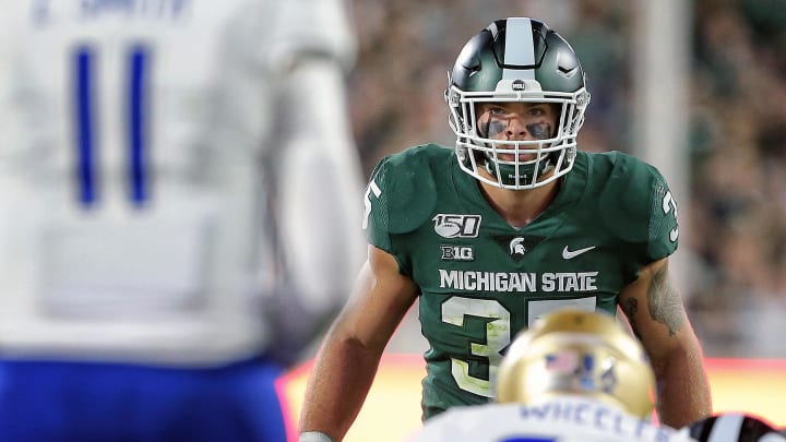 Aug 30, 2019; East Lansing, MI, USA; Michigan State Spartans linebacker Joe Bachie (35) prepares for the snap of the ball during the second half of a game against the Tulsa Golden Hurricane at Spartan Stadium. Mandatory Credit: Mike Carter-USA TODAY Sports Aug 30, 2019; East Lansing, MI, USA; Michigan State Spartans linebacker Joe Bachie (35) prepares for the snap of the ball during the second half of a game against the Tulsa Golden Hurricane at Spartan Stadium. Mandatory Credit: Mike Carter-USA TODAY Sports