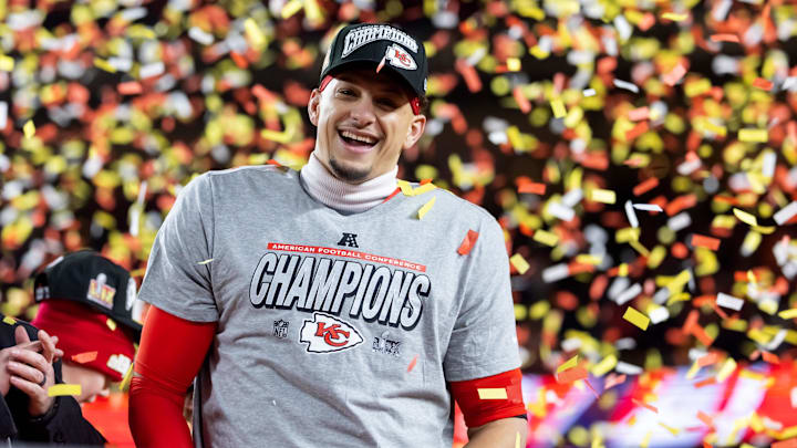 Jan 26, 2025; Kansas City, MO, USA; Confetti falls as Kansas City Chiefs quarterback Patrick Mahomes celebrates after defeating the Buffalo Bills during the AFC Championship game at GEHA Field at Arrowhead Stadium.