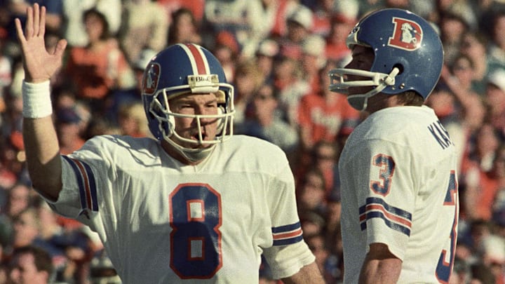 Jan 25, 1987; Pasadena, CA, USA; FILE PHOTO; Denver Broncos quarterback Gary Kubiak (8) and kicker Rich Karlis (3) react on the field against the New York Giants  during Super Bowl XXI at the Rose Bowl. The Giants defeated the Broncos 39-20. 