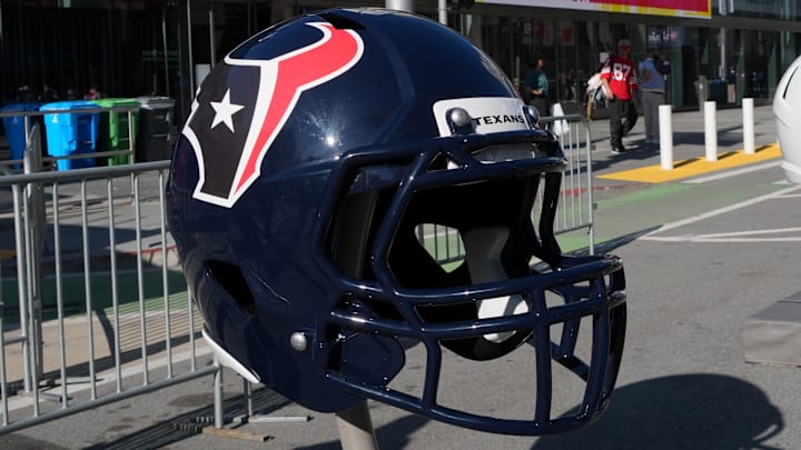 Feb 4, 2026; San Francisco, CA, USA; Large helmets of the Houston Texans, Indianapolis Colts, Jacksonville Jaguars and Tennessee Titans at the Super Bowl LX Experience at the Moscone Center. Mandatory Credit: Kirby Lee-Imagn Images