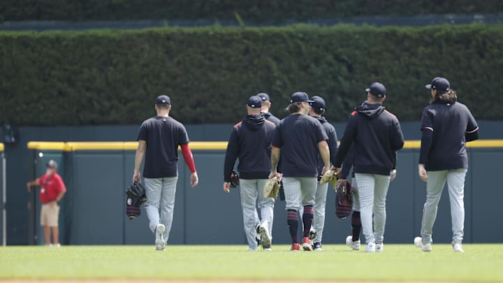 Aug 6, 2025; Detroit, Michigan, USA;  Minnesota Twins relief pitchers walk out to the bullpen in the first inning against the Detroit Tigers at Comerica Park.