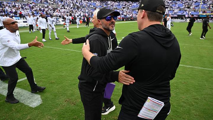 Sep 20, 2026; Baltimore, Maryland, USA; Baltimore Ravens head coach Jesse Minter shakes hands with New Orleans Saints head coach Kellen Moore after the game at M&T Bank Stadium. Mandatory Credit: Jamie Sabau-Imagn Images Sep 20, 2026; Baltimore, Maryland, USA; Baltimore Ravens head coach Jesse Minter shakes hands with New Orleans Saints head coach Kellen Moore after the game at M&T Bank Stadium. Mandatory Credit: Jamie Sabau-Imagn Images