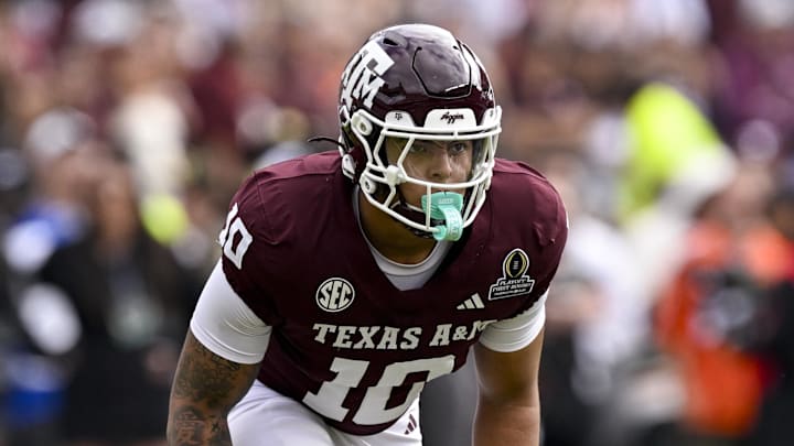 Dec 20, 2025; College Station, TX, USA; Texas A&M Aggies defensive end Marco Jones (10) lines up during the game between the Aggies and the Hurricanes at Kyle Field. Mandatory Credit: Jerome Miron-Imagn Images