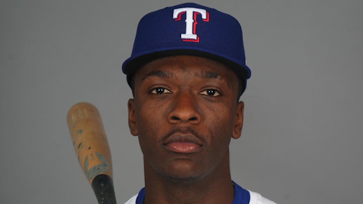 Feb 19, 2025; Surprise, AZ, USA; Texas Rangers player Sebastian Walcott poses for a photo during Media Day at Surprise Stadium.