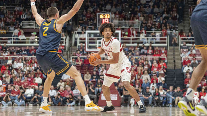 Jan 24, 2026; Stanford, California, USA;  Stanford Cardinal forward Donavin Young (2) looks to pass the ball during the first half against California Golden Bears forward John Camden (2) at Maples Pavilion. Mandatory Credit: Stan Szeto-Imagn Images