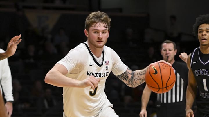Dec 13, 2025; Nashville, Tennessee, USA;  Vanderbilt Commodores forward Tyler Nickel (5) dribbles the ball down the lane against the Central Arkansas Bears during the second half at Memorial Gymnasium. Mandatory Credit: Steve Roberts-Imagn Images