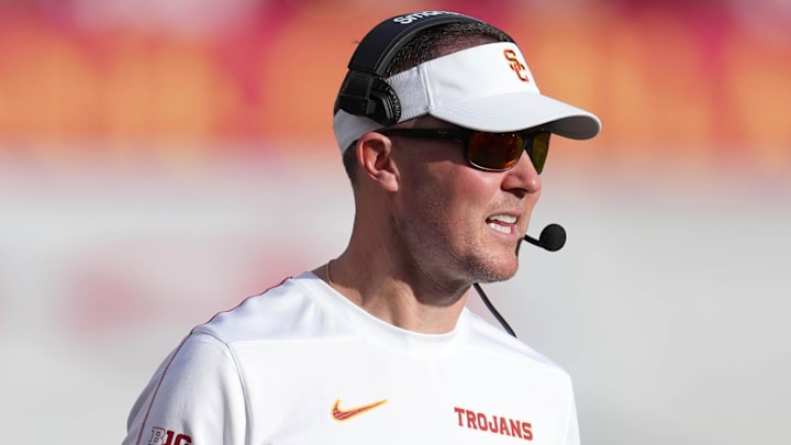 Nov 30, 2024; Los Angeles, California, USA; Southern California Trojans head coach Lincoln Riley reacts against the Notre Dame Fighting Irish in the second half at United Airlines Field at Los Angeles Memorial Coliseum. Mandatory Credit: Kirby Lee-Imagn Images