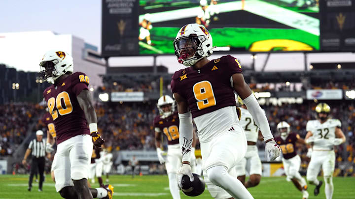 Nov 9, 2024; Tempe, Arizona, USA; Arizona State Sun Devils defensive back Montana Warren (9) returns a blocked punt for a touchdown against the UCF Knights during the first half at Mountain America Stadium, Home of the ASU Sun Devils. Mandatory Credit: Joe Camporeale-Imagn Images