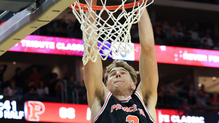 Dec 21, 2024; Newark, New Jersey, USA; Princeton Tigers forward Caden Pierce (3) dunks the ball against the Rutgers Scarlet Knights during the second half at Prudential Center. Mandatory Credit: Tom Horak-Imagn Images