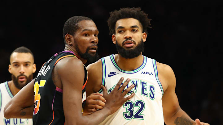 Nov 15, 2023; Phoenix, Arizona, USA; Minnesota Timberwolves center Karl-Anthony Towns (32) against Phoenix Suns forward Kevin Durant (35) at Footprint Center. Mandatory Credit: Mark J. Rebilas-USA TODAY Sports Nov 15, 2023; Phoenix, Arizona, USA; Minnesota Timberwolves center Karl-Anthony Towns (32) against Phoenix Suns forward Kevin Durant (35) at Footprint Center. Mandatory Credit: Mark J. Rebilas-USA TODAY Sports
