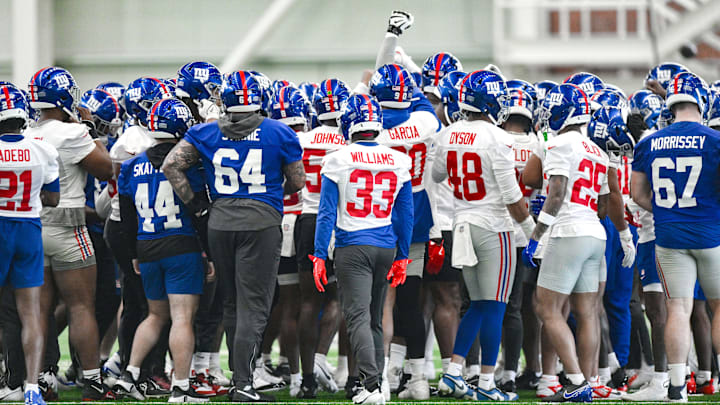 Jun 18, 2025; East Rutherford, NJ, USA; New York Giants huddle during minicamp at Quest Diagnostics Training Center.  