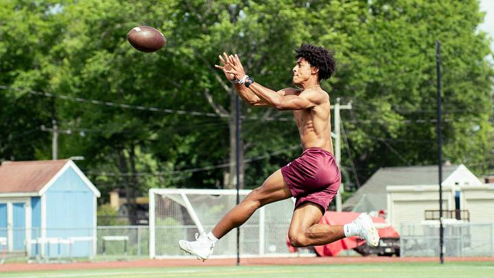 Jalen Moseley receives a pass during off season training Jalen Moseley receives a pass during off season training