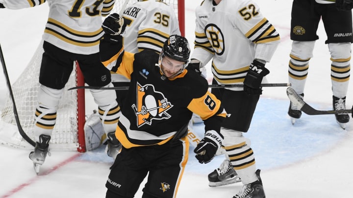 Pittsburgh Penguins left wing Michael Bunting (8) celebrates a goal agaionst the Boston Bruins during the second period at PPG Paints Arena.