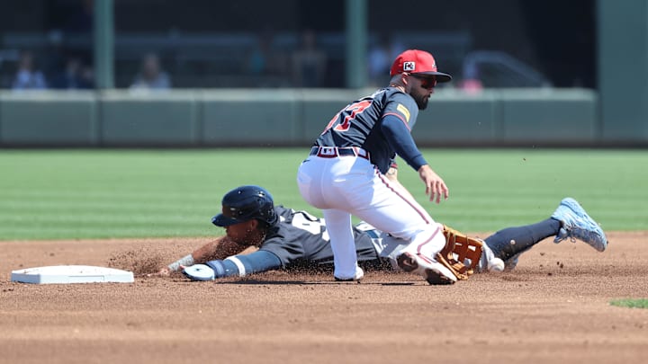 New York Yankees third baseman Oswaldo Cabrera (95) steals second base as Atlanta Braves infielder Eddy Alvarez (87) attempts to tag him out during the second inning at CoolToday Park in North Port, Fla., on March 2, 2025. New York Yankees third baseman Oswaldo Cabrera (95) steals second base as Atlanta Braves infielder Eddy Alvarez (87) attempts to tag him out during the second inning at CoolToday Park in North Port, Fla., on March 2, 2025.