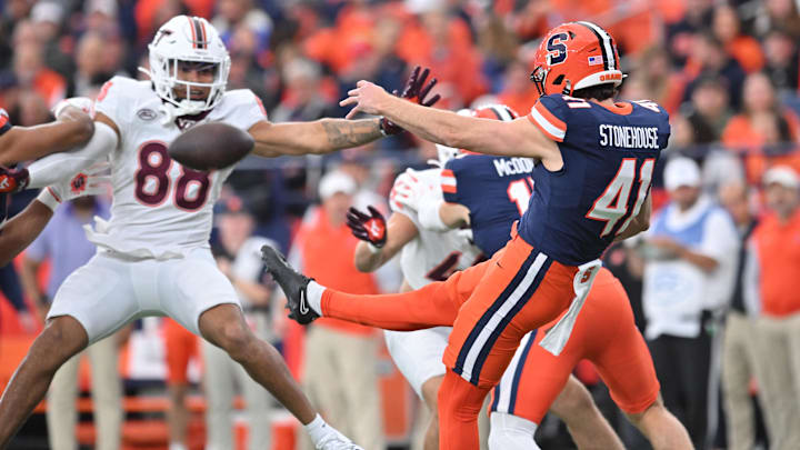 Nov 2, 2024; Syracuse, New York, USA; Syracuse Orange punter Jack Stonehouse (41) is pressured by Virginia Tech Hokies tight end Zeke Wimbush (88) during a punt in the first quarter at JMA Wireless Dome. Mandatory Credit: Mark Konezny-Imagn Images Nov 2, 2024; Syracuse, New York, USA; Syracuse Orange punter Jack Stonehouse (41) is pressured by Virginia Tech Hokies tight end Zeke Wimbush (88) during a punt in the first quarter at JMA Wireless Dome. Mandatory Credit: Mark Konezny-Imagn Images