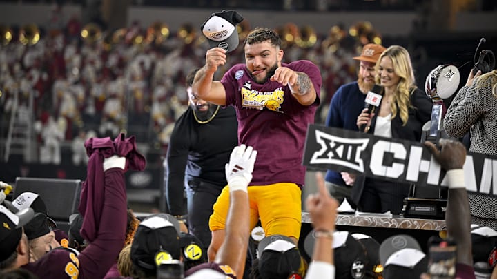 Arizona State Sun Devils running back Cam Skattebo (4) celebrates after the Sun Devils beat Iowa State to win the Big 12 football championship.