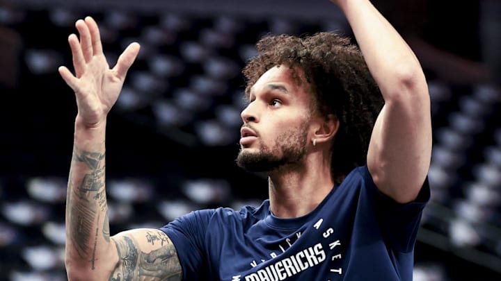 Dallas Mavericks center Dereck Lively II warms up for a game.